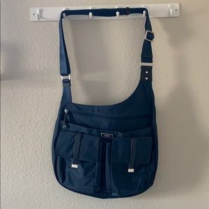 Tumi Crossbody travel purse